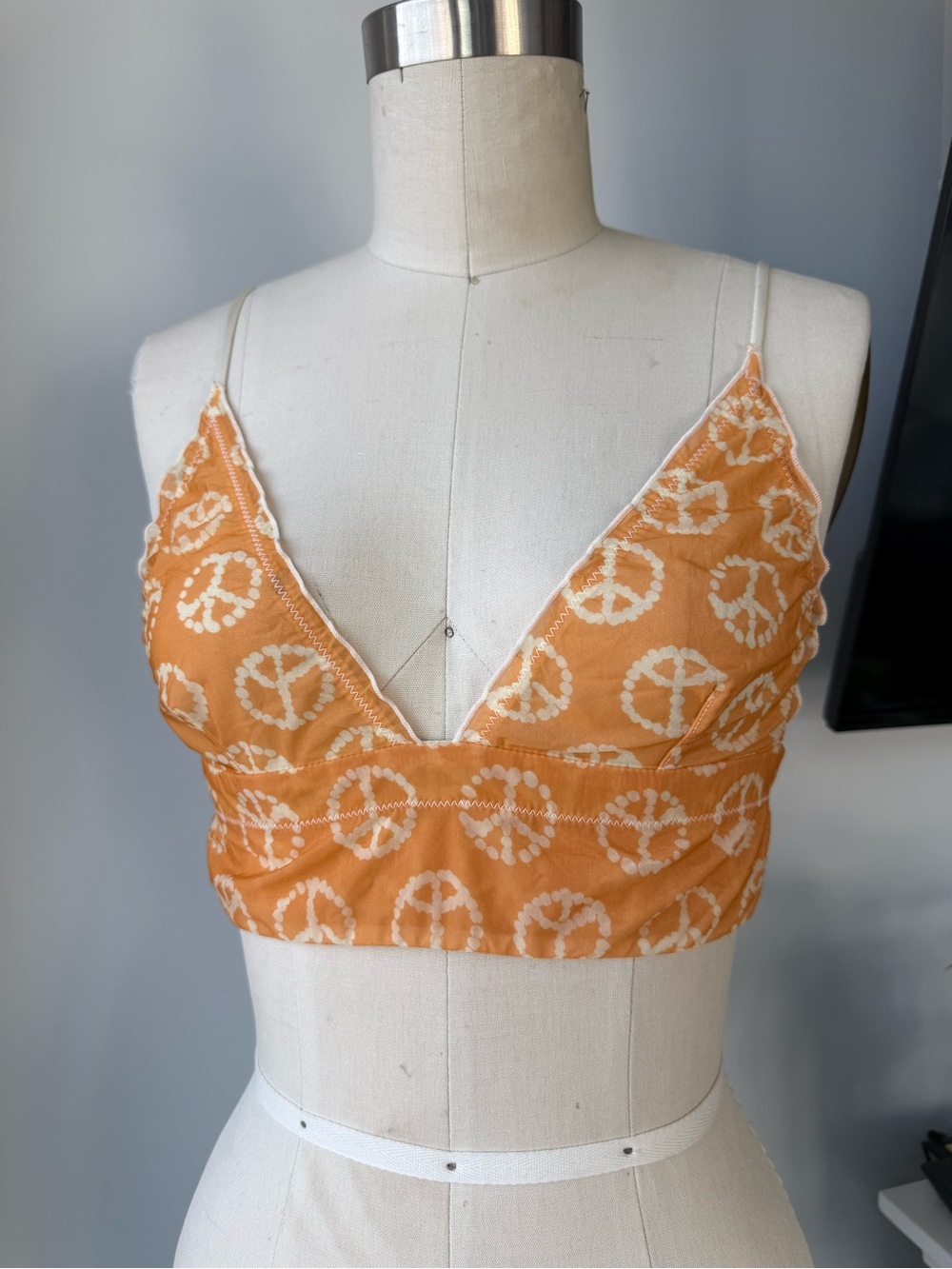 Urban Outfitters out from under Peace Sign Crop Bralette